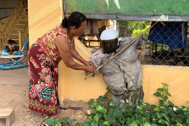Cambodian villagers trust magic scarecrows to ward off coronavirus